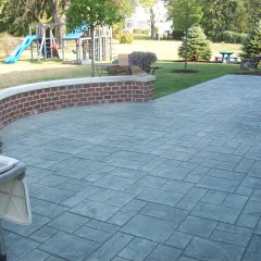 Ashlar Slate Concrete Patio and Brick Seating Wall