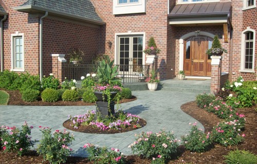 https://www.budsconcreteinc.com/wp-content/uploads/2016/03/Raised-Ashlar-Slate-Concrete-Entryway-and-Circular-walkway-500x320.jpg