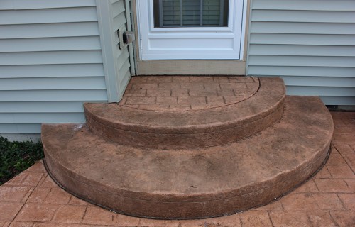 https://www.budsconcreteinc.com/wp-content/uploads/2016/03/Textured-Steps-With-Mayan-Cobblestone-Inlay-500x320.jpg